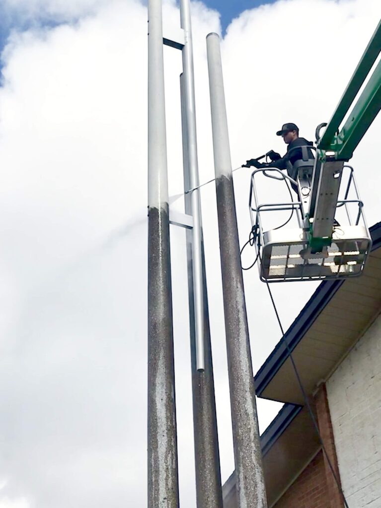 pressure washing a building